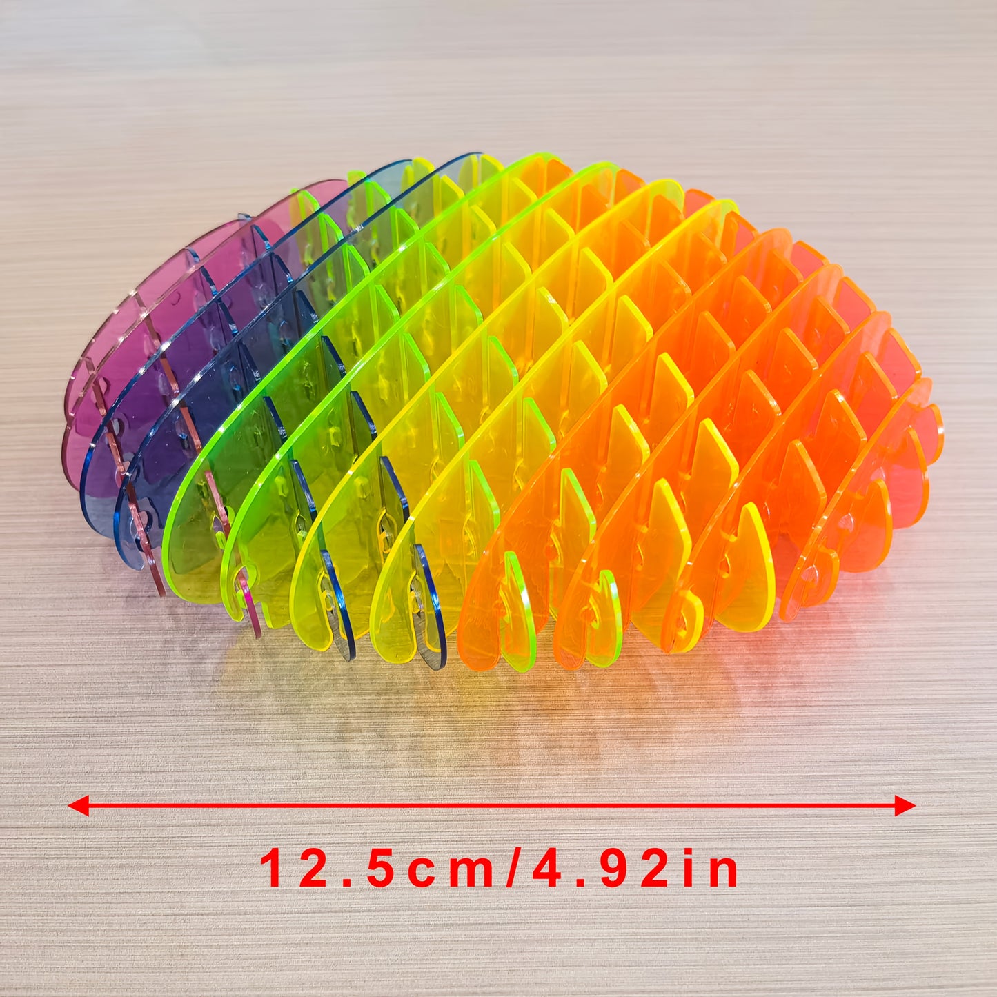 A Set of Elastic Nets Available in Various Innovative Color Combinations, Featuring Large Elastic Feet That Can Change Shape.